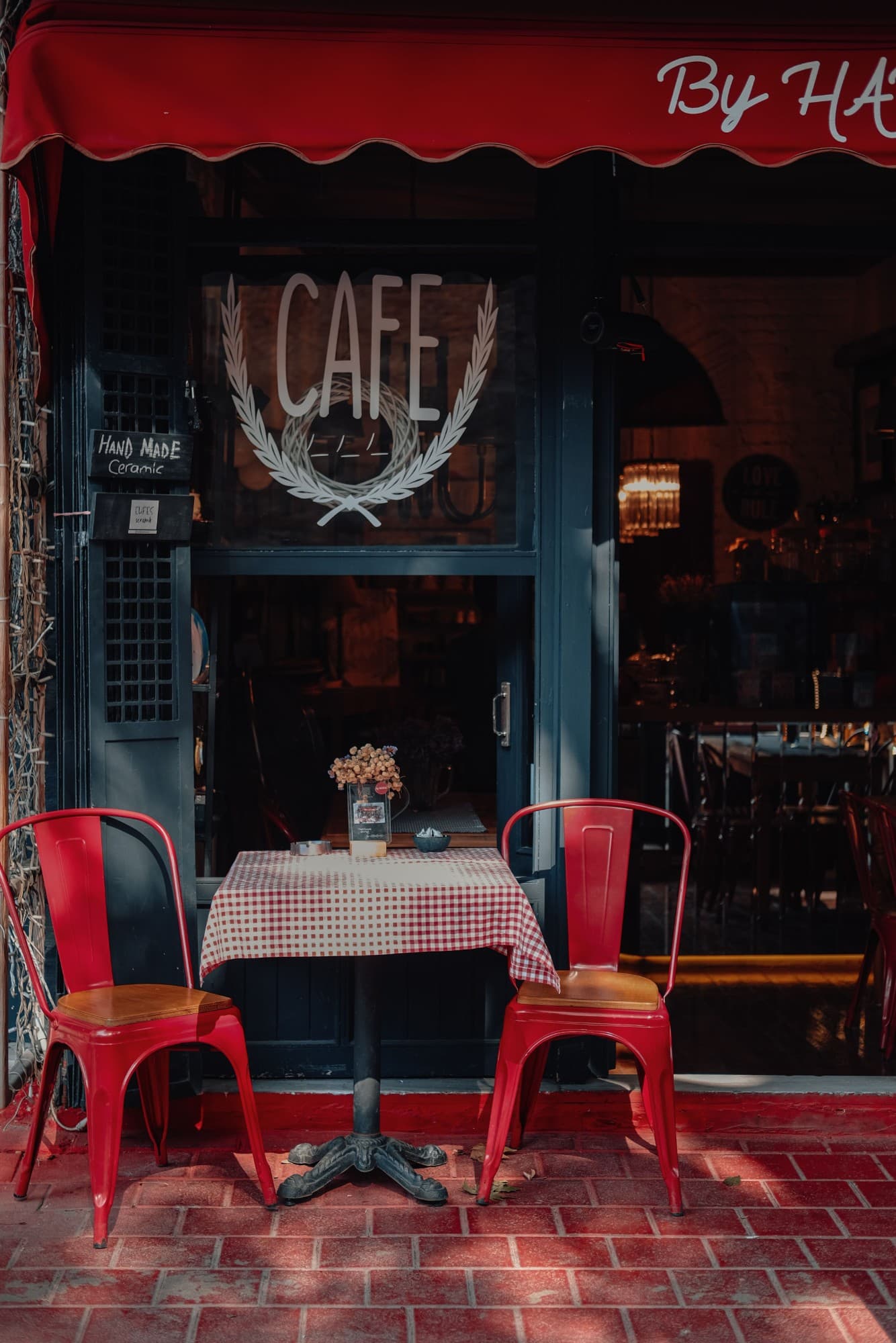Small business owner serving customers at a Melbourne bakery