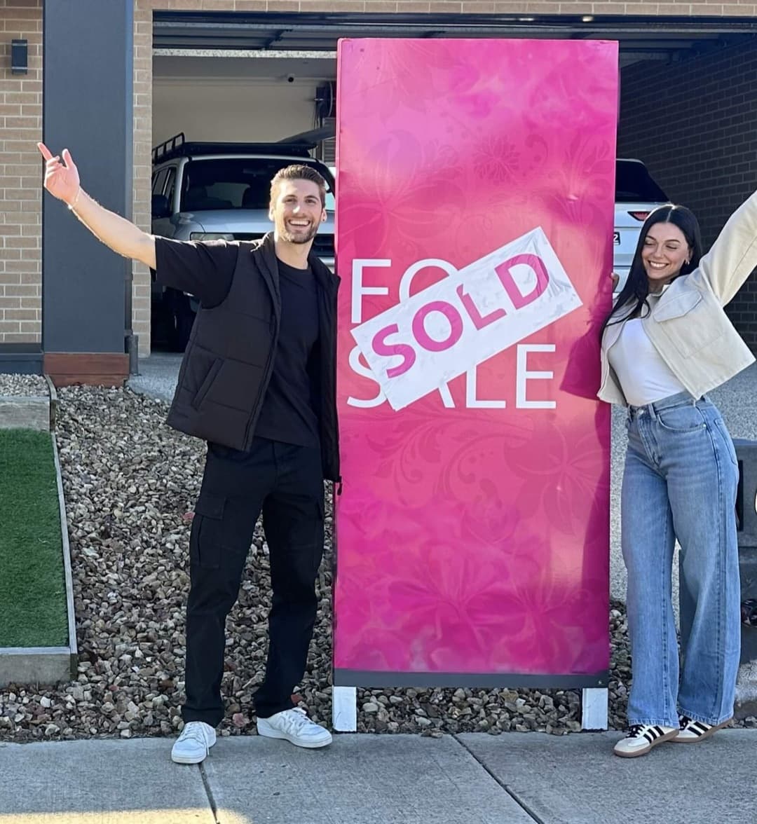 Melbourne first home buyers celebrating after settlement